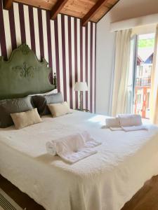 Uma cama ou camas num quarto em Villa Silene