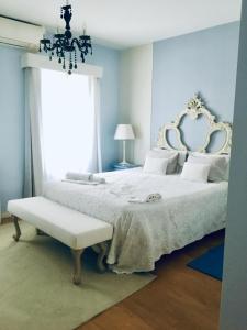 Uma cama ou camas num quarto em Villa Silene