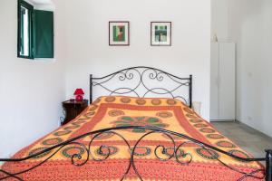 Postel nebo postele na pokoji v ubytování Physis b&b-a casa di Clio