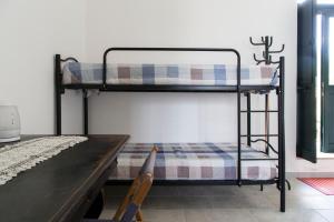 Postel nebo postele na pokoji v ubytování Physis b&b-a casa di Clio