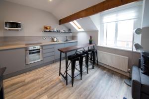 Una cocina o zona de cocina en Blackbird Luxury Apartments Room 4