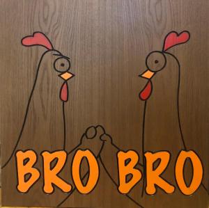 a painting of three chickens with the word broo at BroBro hostel in Tbilisi City