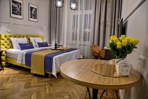 Łóżko lub łóżka w pokoju w obiekcie Bentis Luxury Apartments