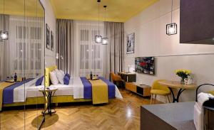 Łóżko lub łóżka w pokoju w obiekcie Bentis Luxury Apartments
