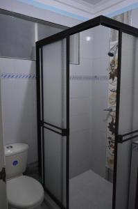 a shower stall with a toilet in a bathroom at The Clover 20-28 in Palmira