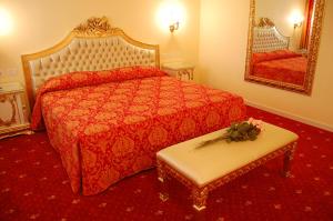 Postel nebo postele na pokoji v ubytování Hotel Motel Gold