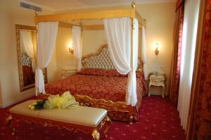 Postel nebo postele na pokoji v ubytování Hotel Motel Gold