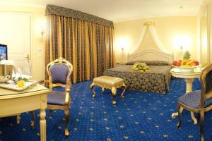 Postel nebo postele na pokoji v ubytování Hotel Motel Gold