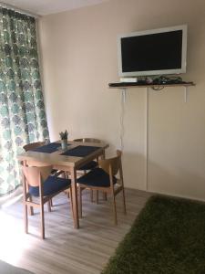 Televízia a/alebo spoločenská miestnosť v ubytovaní Adrian's Home