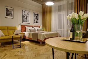 Łóżko lub łóżka w pokoju w obiekcie Bentis Luxury Apartments