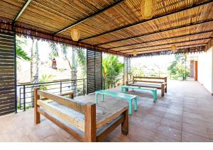 Balkón nebo terasa v ubytování Indah Bali Guesthouse