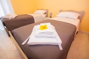 A bed or beds in a room at Etna Sunshine