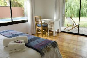 Cama ou camas em um quarto em Casa Lopez
