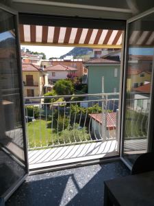 a view from the window of a balcony at La Casa di Zoe - Terre del Magra in Bocca di Magra