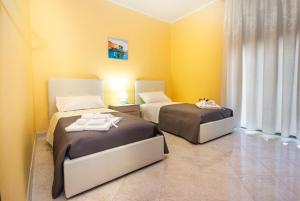 A bed or beds in a room at Etna Sunshine