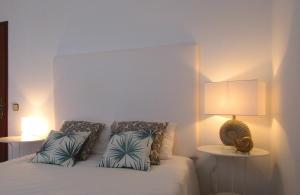 Postel nebo postele na pokoji v ubytování Casa Encantada - Praia da Rocha