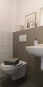 Kúpeľňa v ubytovaní Glam House Apartments