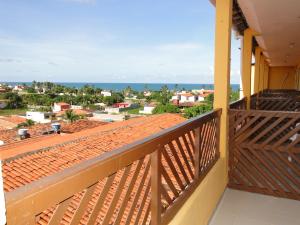 a balcony with a view of the ocean at Pousada Recanto da Enseada in Cabo de Santo Agostinho