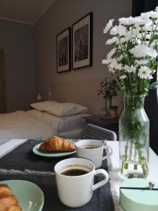 Posteľ alebo postele v izbe v ubytovaní Glam House Apartments