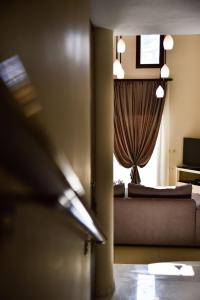TV a/nebo společenská místnost v ubytování Kavala Luxury House