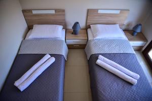 Postel nebo postele na pokoji v ubytování Kavala Luxury House