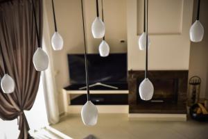 TV a/nebo společenská místnost v ubytování Kavala Luxury House