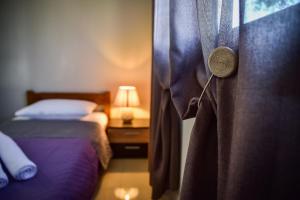 Postel nebo postele na pokoji v ubytování Kavala Luxury House