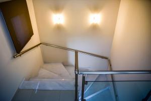 Postel nebo postele na pokoji v ubytování Kavala Luxury House