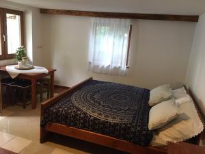 Posteľ alebo postele v izbe v ubytovaní Pajta Apartman