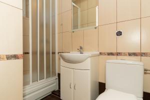 a bathroom with a toilet and a sink at KRAB 2 in Rewal +123 photos