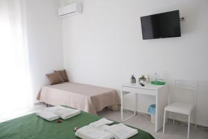 Posteľ alebo postele v izbe v ubytovaní B&B d'Orleans