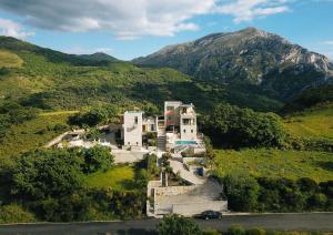 an aerial view of a house in a mountain at Anna Boutique Villas in Mixórrouma