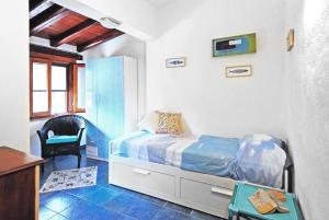 A seating area at Acquamarina - Exclusive Sea House