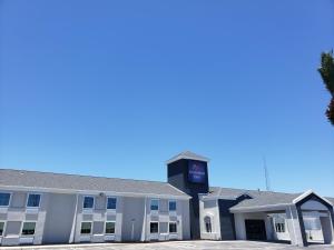 a building with a clock on the front of it at Hathaway Inn in Panama City