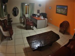 TV a/nebo společenská místnost v ubytování Quinta Comala Hotel & Villas