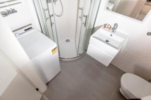 Koupelna v ubytování Resort Apartamenty Klifowa Rewal 19
