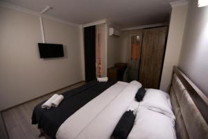 Postel nebo postele na pokoji v ubytování Hotel Aristocrat Batumi