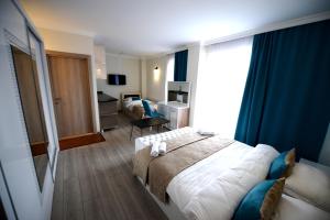 Postel nebo postele na pokoji v ubytování Hotel Aristocrat Batumi