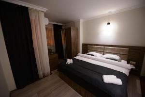 Postel nebo postele na pokoji v ubytování Hotel Aristocrat Batumi