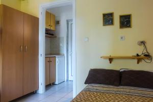 Kuchyň nebo kuchyňský kout v ubytování KATIA Studios + 23 fotografií