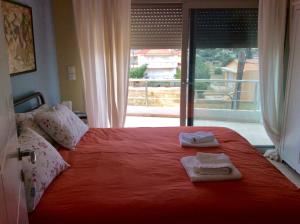 Ένα ή περισσότερα κρεβάτια σε δωμάτιο στο Sunset at Cape Sounio +128 φωτογραφίες