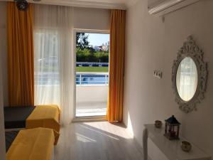 Postel nebo postele na pokoji v ubytování Aroma Butik Hotel
