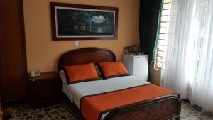 Letto o letti in una camera di Hotel Tequendama