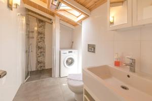 Koupelna v ubytování Kasinn Apart Hotel + 37 fotografií