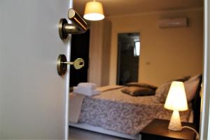 A bed or beds in a room at B&B Relais Aeclanum
