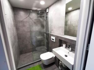 Kúpeľňa v ubytovaní Sky Apartments - Łagiewniki