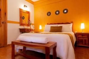 Postel nebo postele na pokoji v ubytování Casablanca Hotel Tula