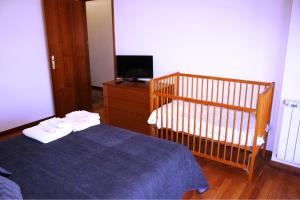 Postel nebo postele na pokoji v ubytování Arco Da Porta Nova