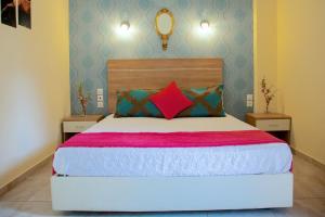 Ένα ή περισσότερα κρεβάτια σε δωμάτιο στο Kaplanis House 