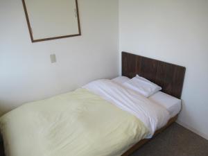 Hotel Crown Hills Kitami Annex客房内的一张或多张床位